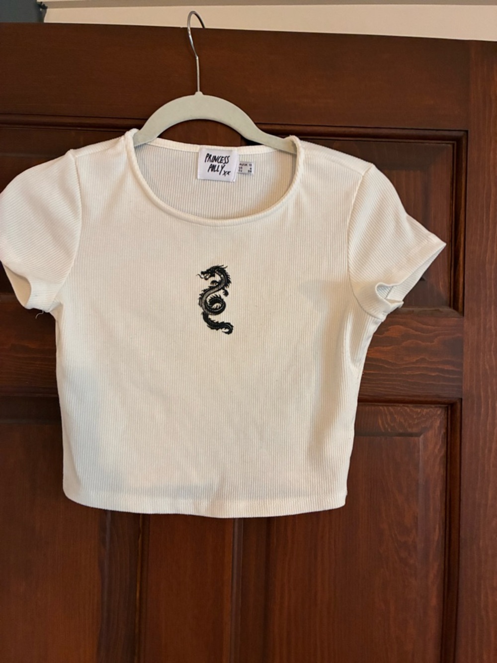 Princess Polly Cream Ribbed Cropped Tee with Black Dragon